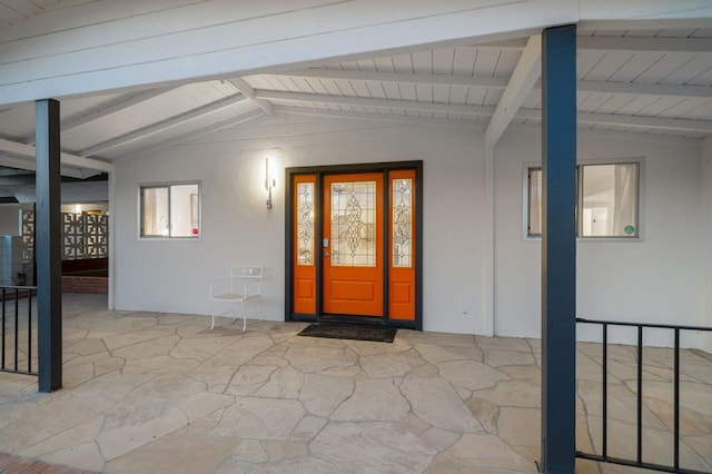 doorway to property featuring covered porch