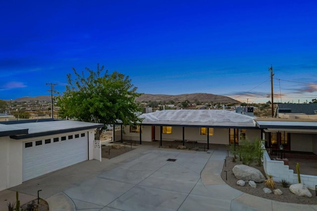 exterior space featuring a mountain view and a porch