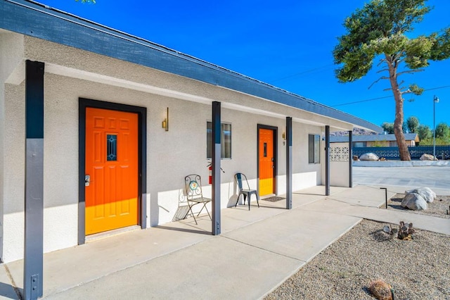 property entrance with a porch