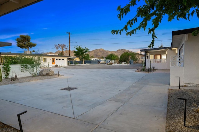 exterior space featuring a mountain view and a garage