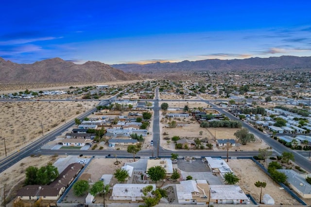 drone / aerial view featuring a mountain view