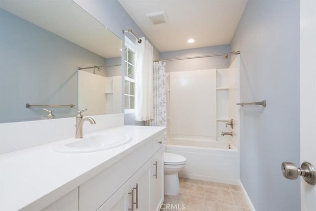 full bathroom with tile patterned floors, vanity, shower / bathtub combination with curtain, and toilet