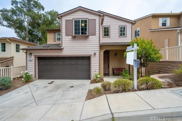 view of front of property featuring a garage