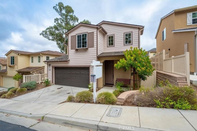 view of front of property with a garage