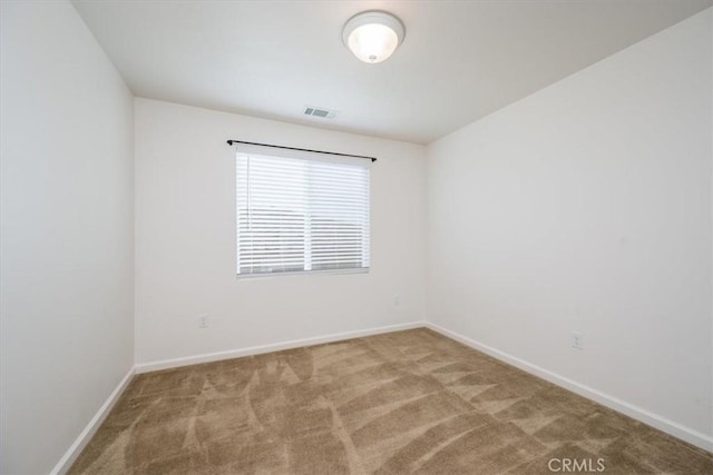 unfurnished room with carpet flooring