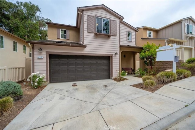 view of front of property with a garage