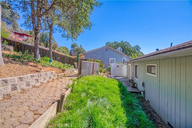 view of yard with a fenced backyard