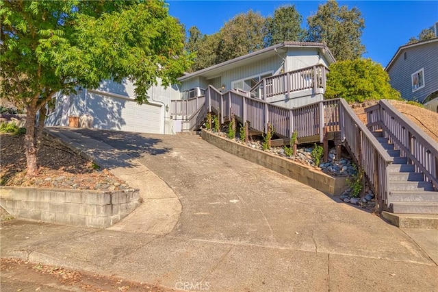 view of front of property with stairway