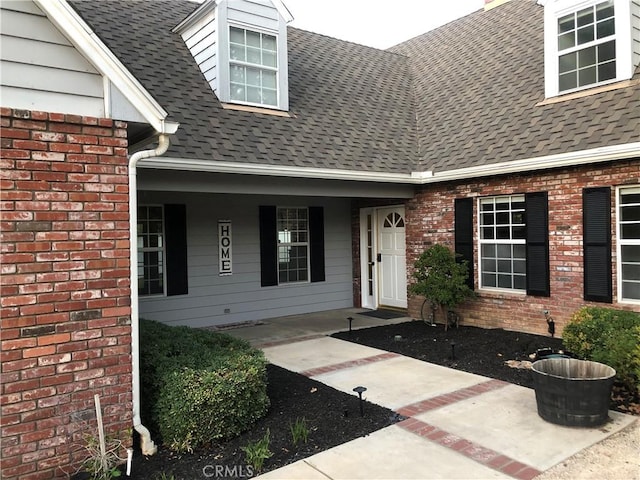 property entrance featuring covered porch