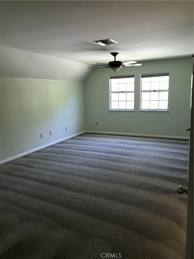 bonus room featuring carpet floors, vaulted ceiling, and ceiling fan