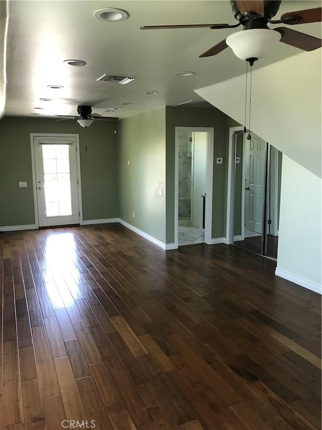 empty room featuring dark hardwood / wood-style floors