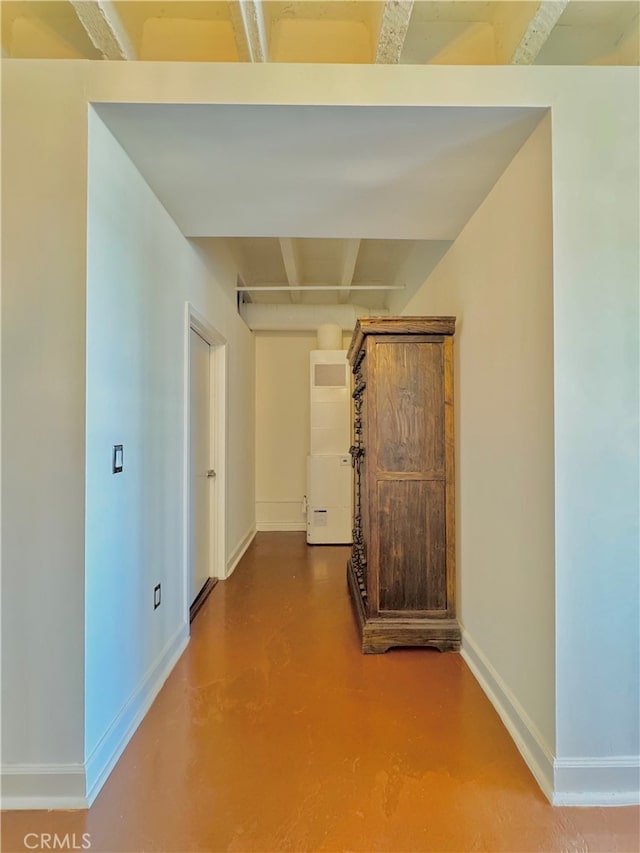 corridor with concrete flooring