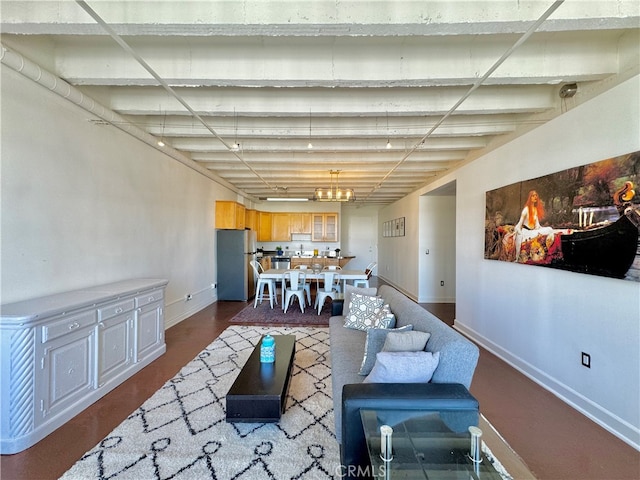 living room with an inviting chandelier