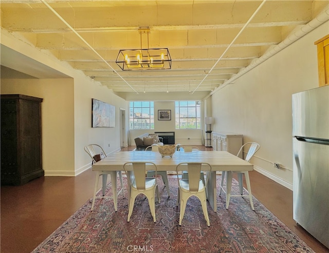 dining area featuring a chandelier