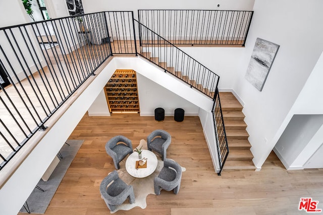 stairway with wood-type flooring