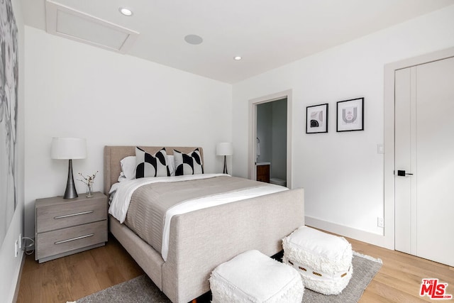 bedroom featuring light wood-type flooring