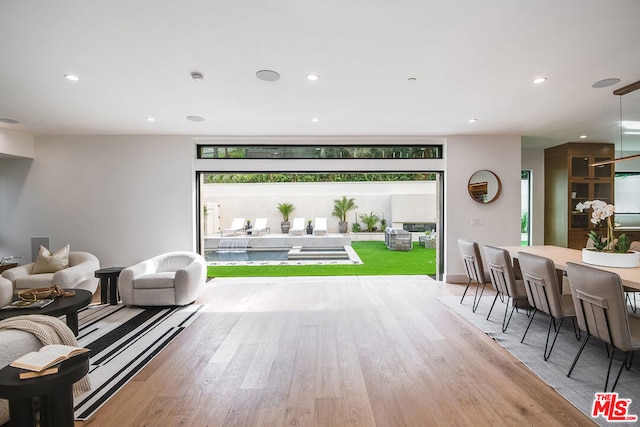 game room featuring light wood-type flooring