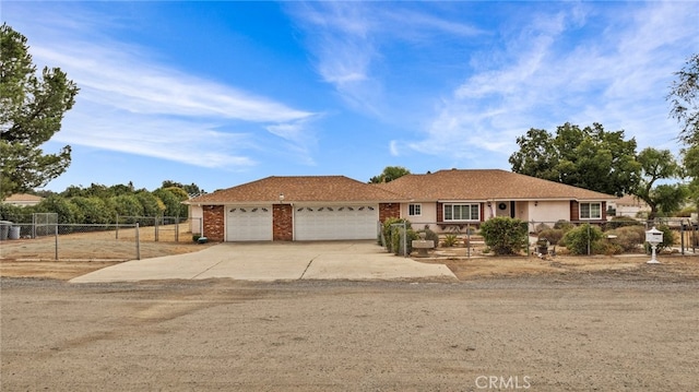 single story home featuring a garage