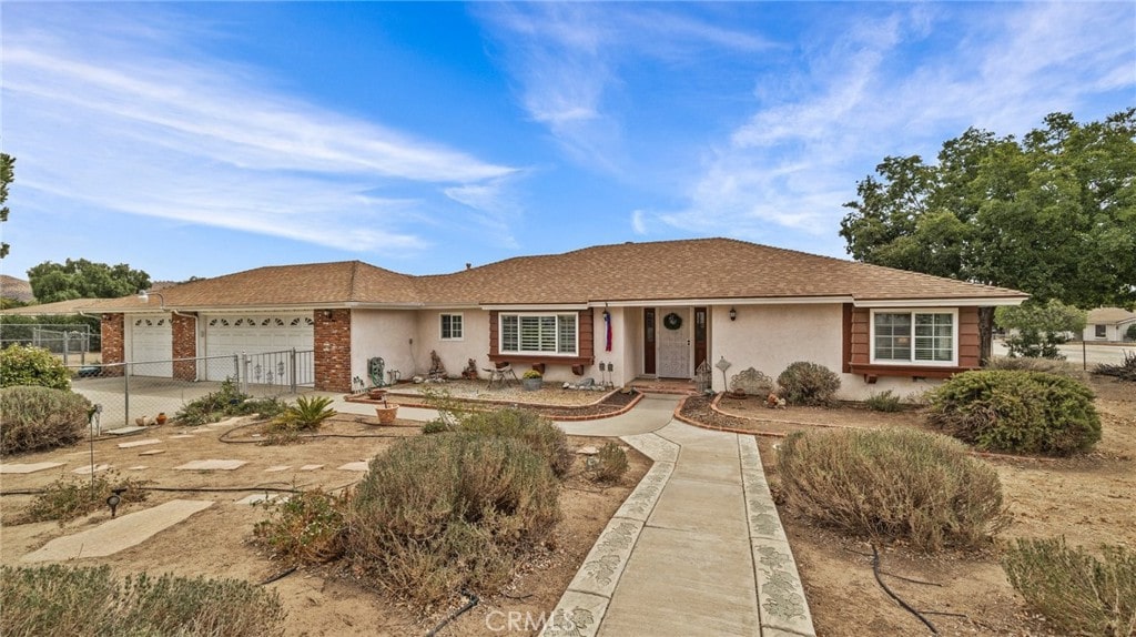 single story home featuring a garage