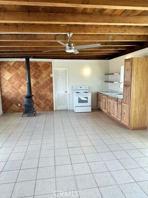 kitchen with white range with electric stovetop, ceiling fan, and light tile patterned floors