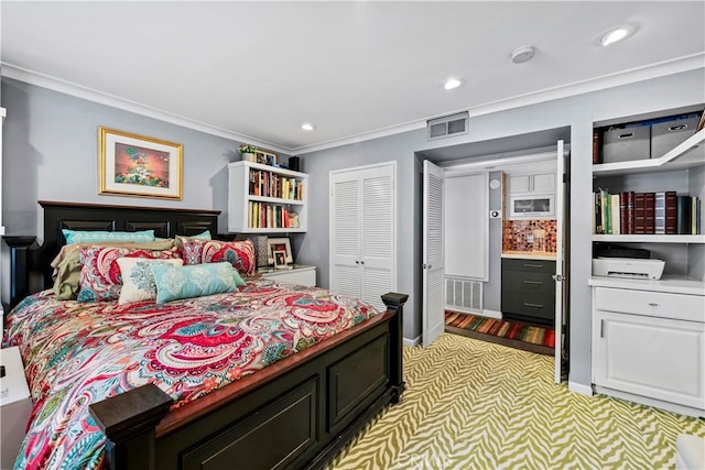 bedroom featuring light carpet and ornamental molding