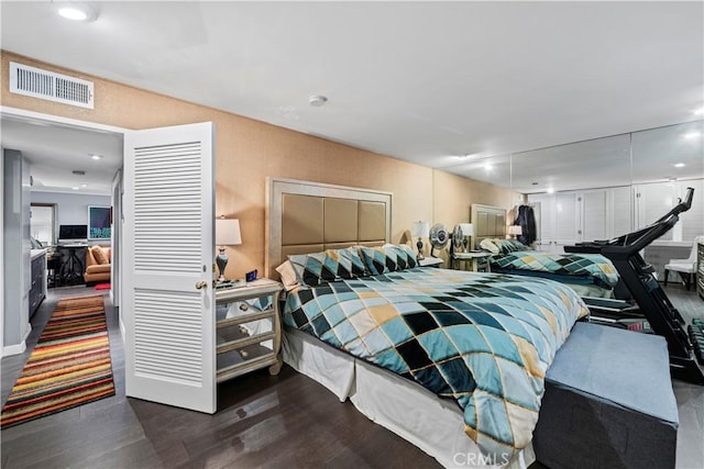 bedroom featuring dark hardwood / wood-style floors