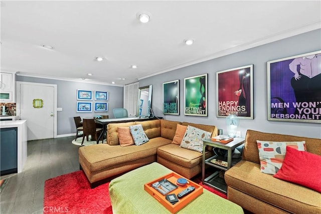 living room featuring dark hardwood / wood-style flooring and crown molding