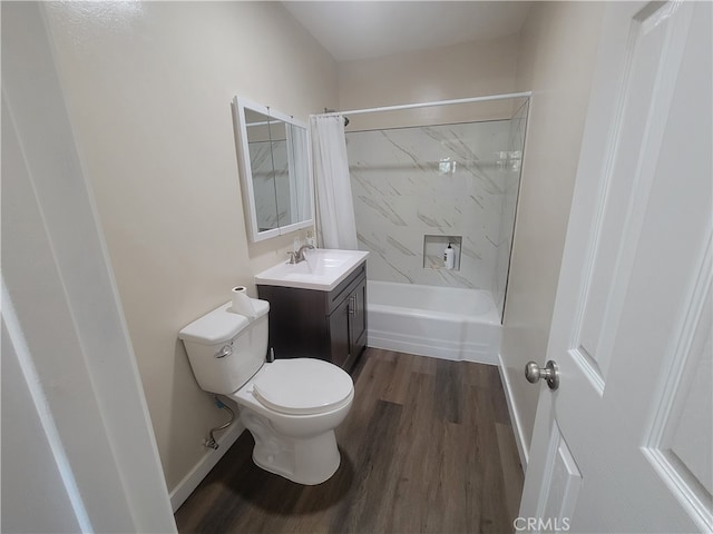 full bathroom featuring vanity, shower / tub combo, hardwood / wood-style floors, and toilet