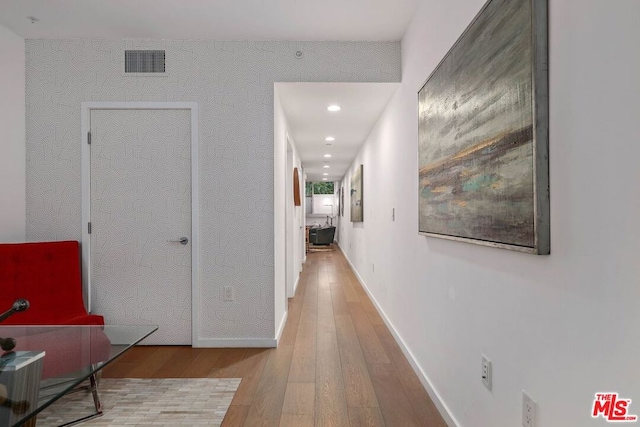 hallway featuring light wood-type flooring