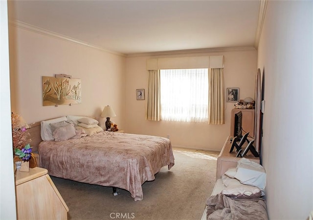 bedroom with carpet flooring and ornamental molding