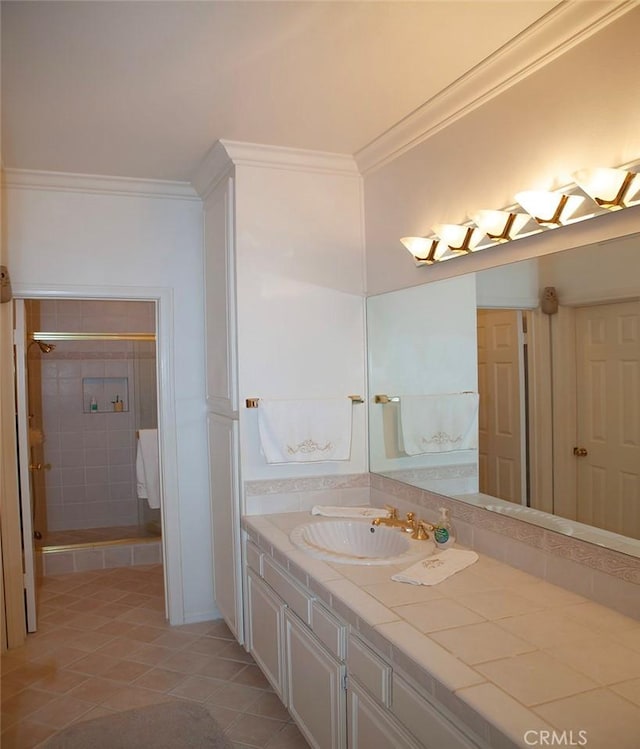 bathroom with vanity, tile patterned floors, and ornamental molding