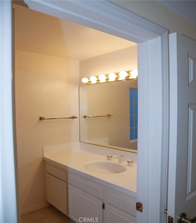 bathroom with vanity and tile patterned flooring