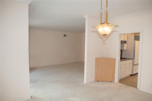 unfurnished room with crown molding, light carpet, and visible vents