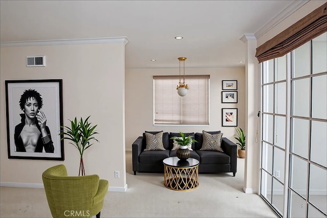 living area with crown molding, visible vents, and baseboards