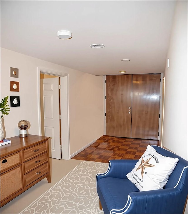 sitting room featuring visible vents