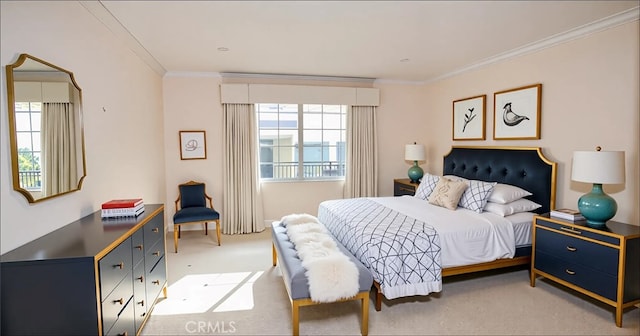 bedroom featuring ornamental molding and light carpet