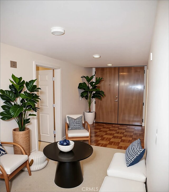 living area featuring recessed lighting