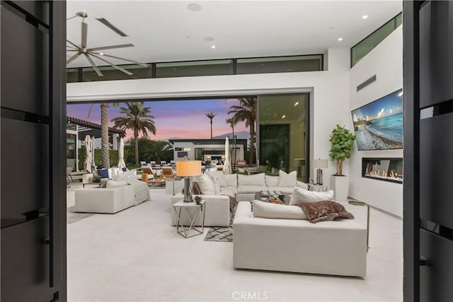 living room with ceiling fan