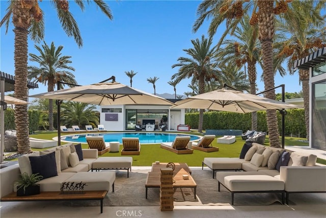 view of swimming pool featuring outdoor lounge area and a patio area