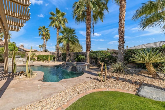 view of swimming pool with an in ground hot tub and a patio