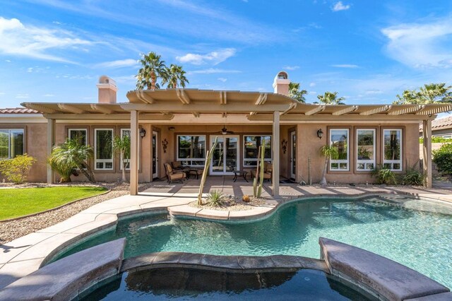 view of pool featuring a patio and french doors