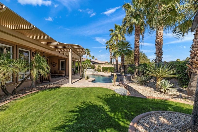 view of yard with a fenced in pool, a pergola, and a patio