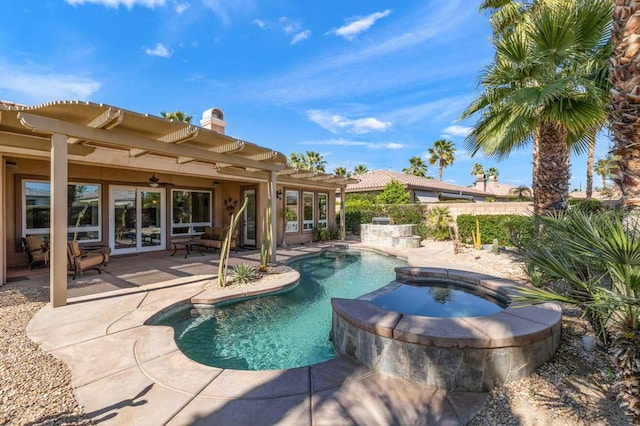 view of swimming pool with a patio area, ceiling fan, and an in ground hot tub