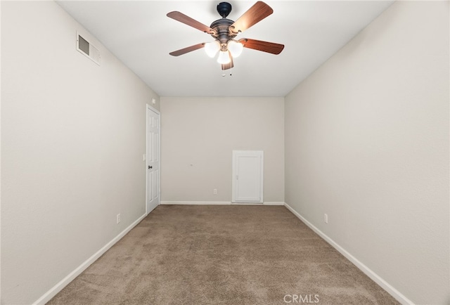 unfurnished room with carpet floors and ceiling fan