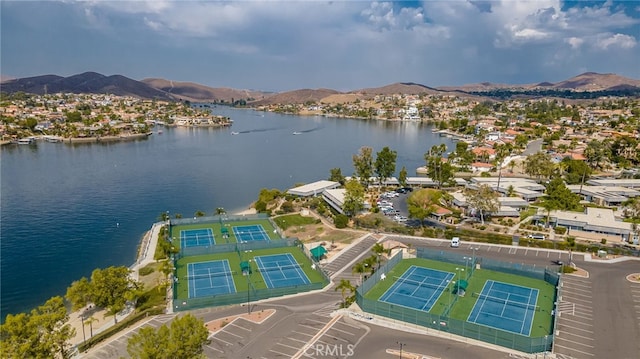 bird's eye view featuring a water and mountain view