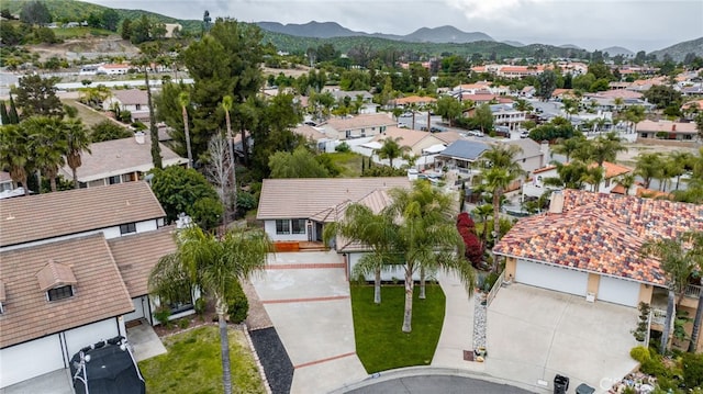 drone / aerial view featuring a mountain view