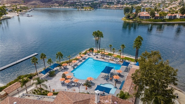 birds eye view of property featuring a water view