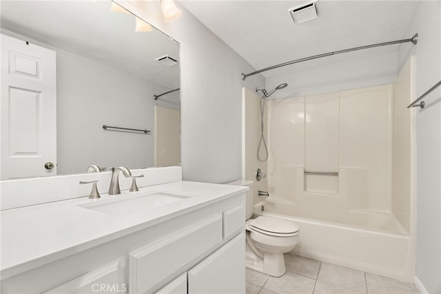 full bathroom with tile patterned floors, toilet, vanity, and washtub / shower combination