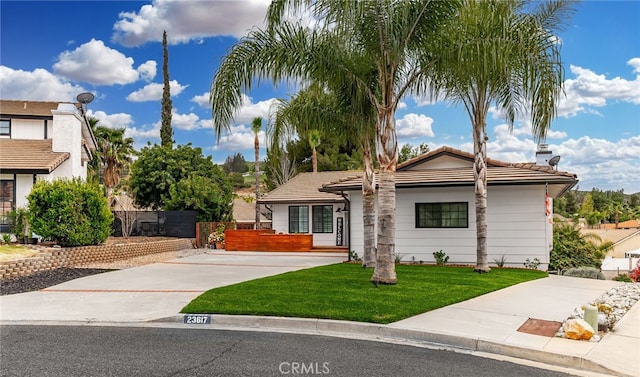 view of front of home with a front yard