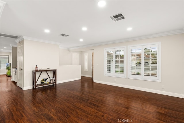 unfurnished room with crown molding and dark hardwood / wood-style flooring